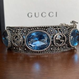 Gucci sterling silver GG large blue stone bangle